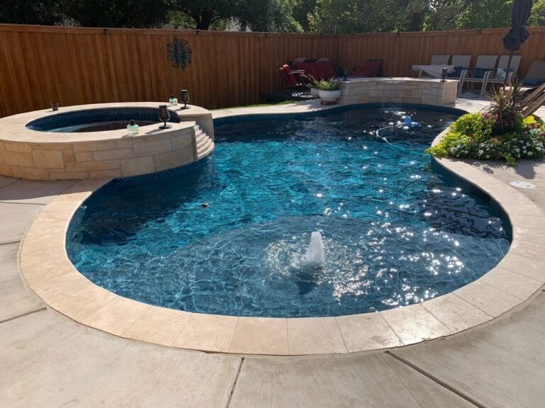 pool with conjoined hot tub